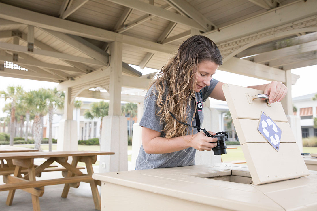 The research team may be seen taking pictures of litter items or waste management infrastructure, as photographic documentation is a key part of data collection for CAP.