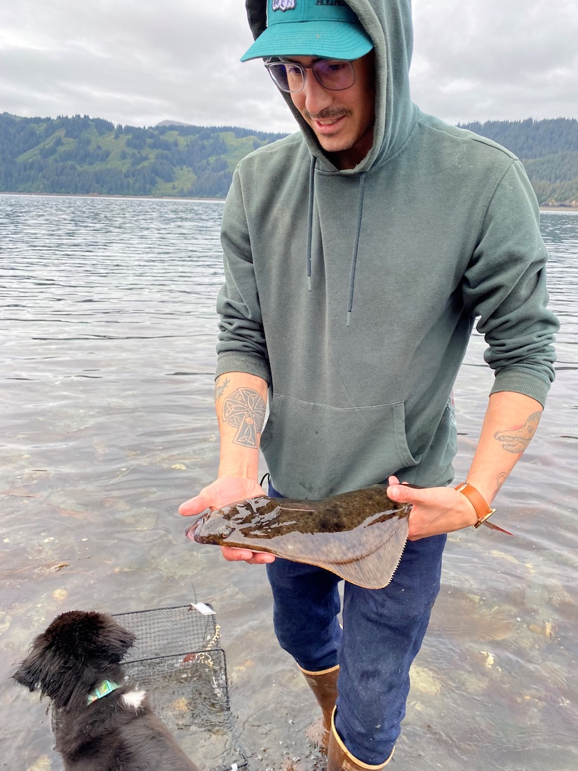 Stephen Payton holding a halibut.