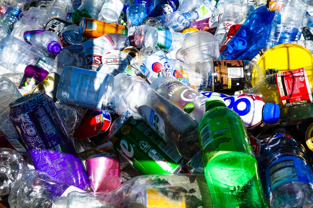 Pile Of Recycled Plastic Water Bottle Containers by Stocksy Contributor  Rialto Images - Stocksy