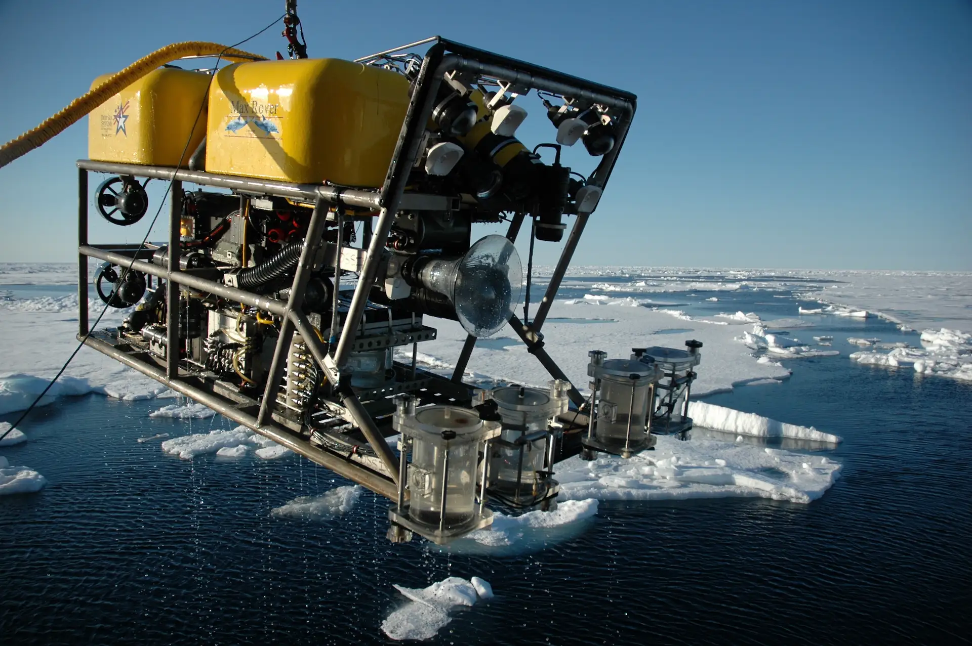 ROV hangs above ice water.
