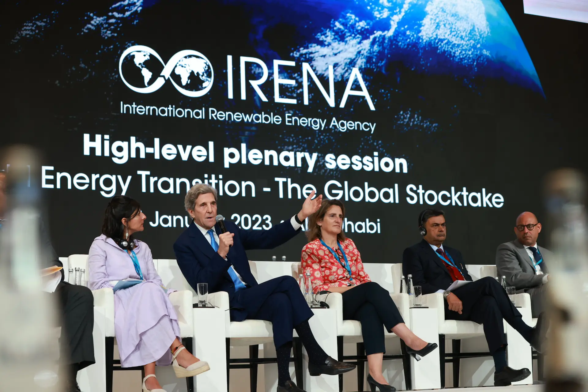 A panel speaks at the renewable energy event