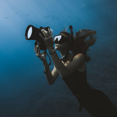 Photographer Rachel Moore taking photos underwater